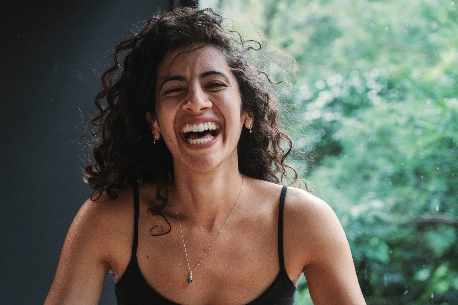 Haneen Khan, intimacy coach, smiling